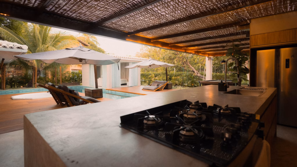Custom outdoor kitchen design with built-in grill and stone countertop in the Portland metro