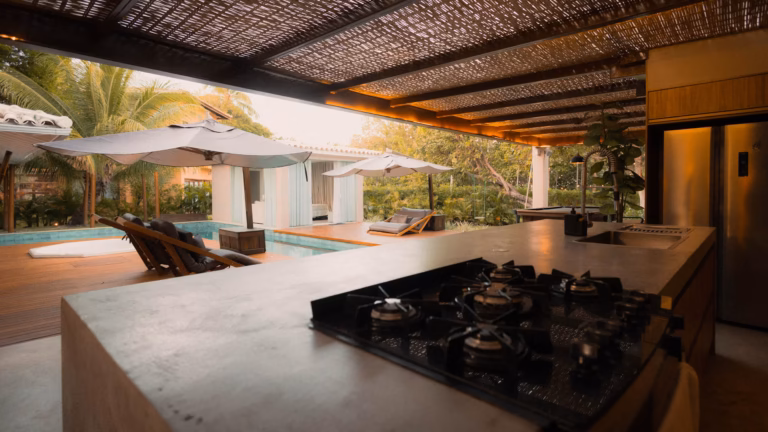Custom outdoor kitchen design with built-in grill and stone countertop in the Portland metro